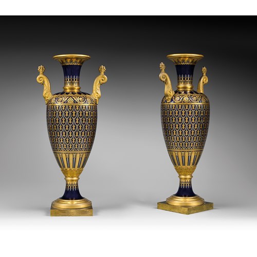 A royal pair of Sèvres ormolu-mounted two-handles porcelain beau bleu Vases Fuseaux. Sèvres, Imperial Manufacture of Sèvres ,1813.